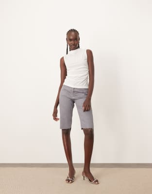 Cleo denim longline shorts with raw hem in slate gray