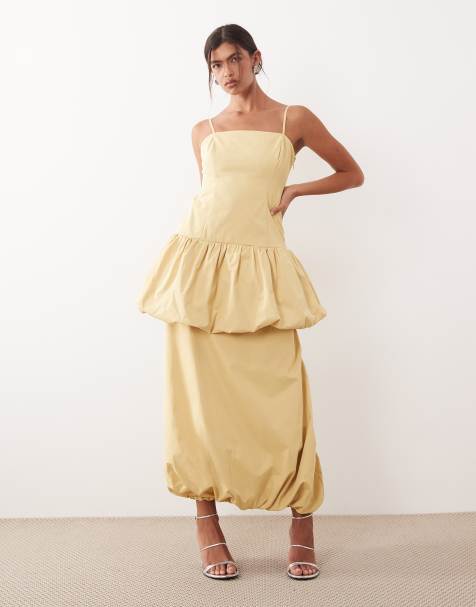 ARRANGE - Conjunto amarillo pastel de top largo abullonado de tirantes y falda midi - view 1