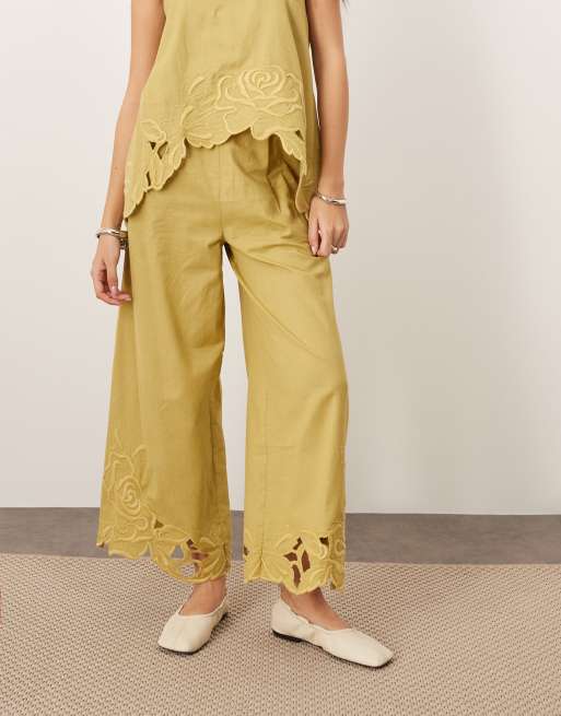 ARRANGE cotton embroidered floral cutwork pants in olive green - part of a set