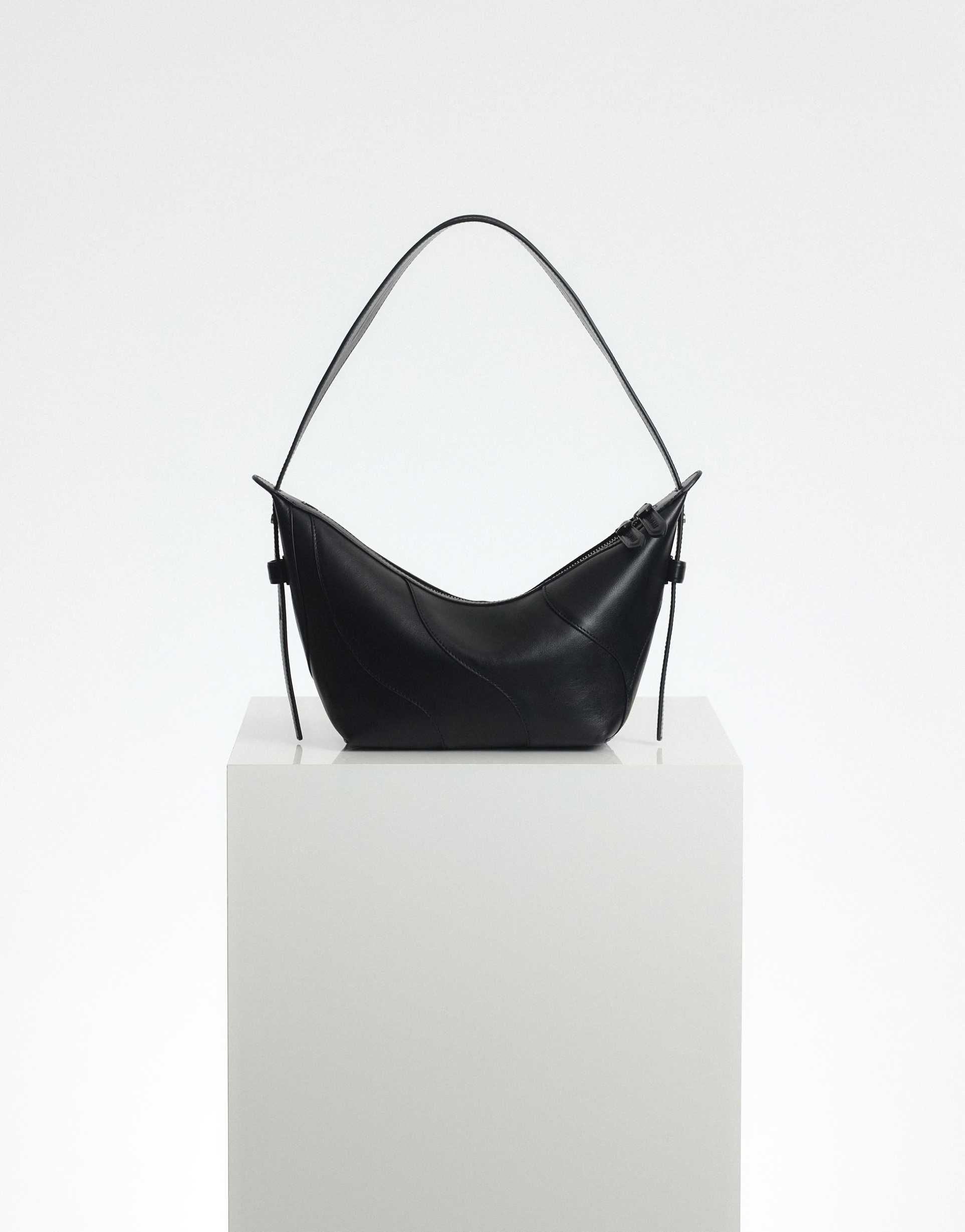 arrange crescent leather bag in black