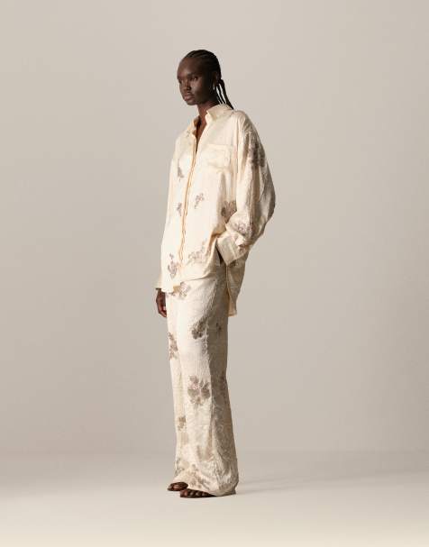 ARRANGE crinkle satin floral embellished pants in cream - part of a set - view 1