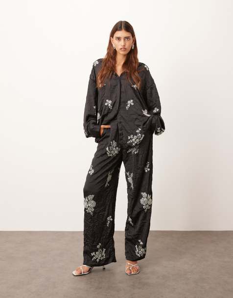 ARRANGE crinkle satin floral embellished trouser co-ord in black