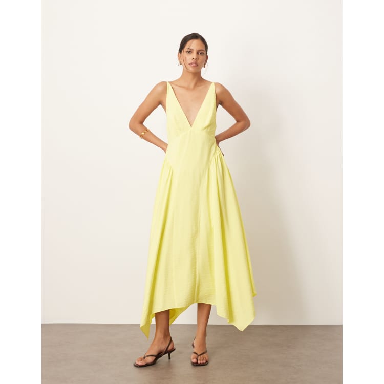 ARRANGE cross back detail midi dress with full skirt in yellow | ASOS