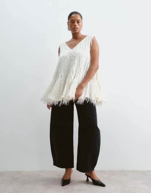 ARRANGE Curve all over fringe longline peplum top in ivory, 2 of 5