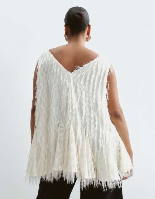 ARRANGE Curve all over fringe longline peplum top in ivory, 3 of 5