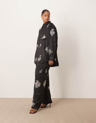 ARRANGE Curve crinkle satin floral embellished pants in black - part of a set