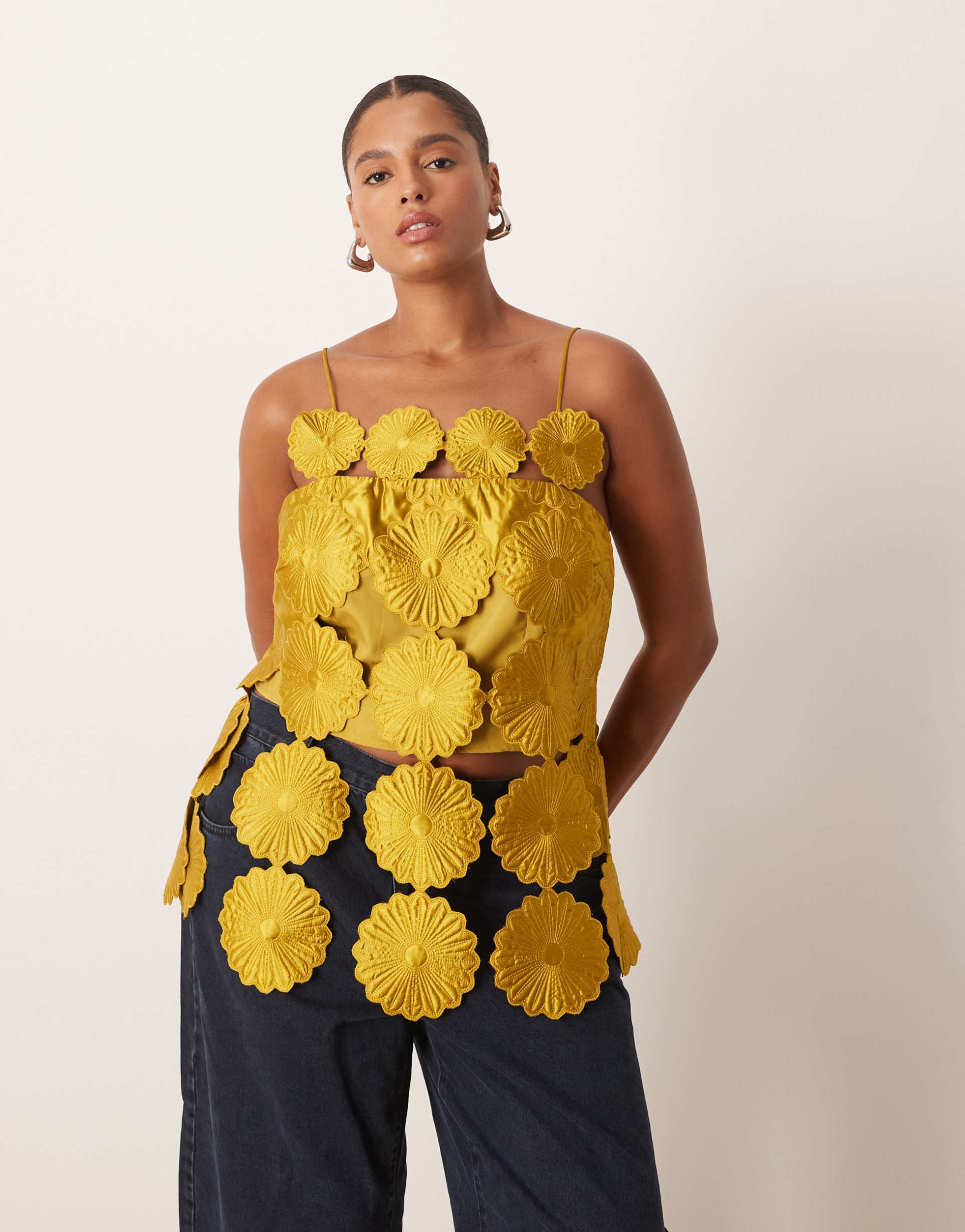 arrange curve cut work floral fringe hem top in gold