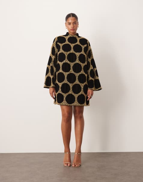 ARRANGE Curve embellished spot high neck long sleeve mini dress in gold - view 1