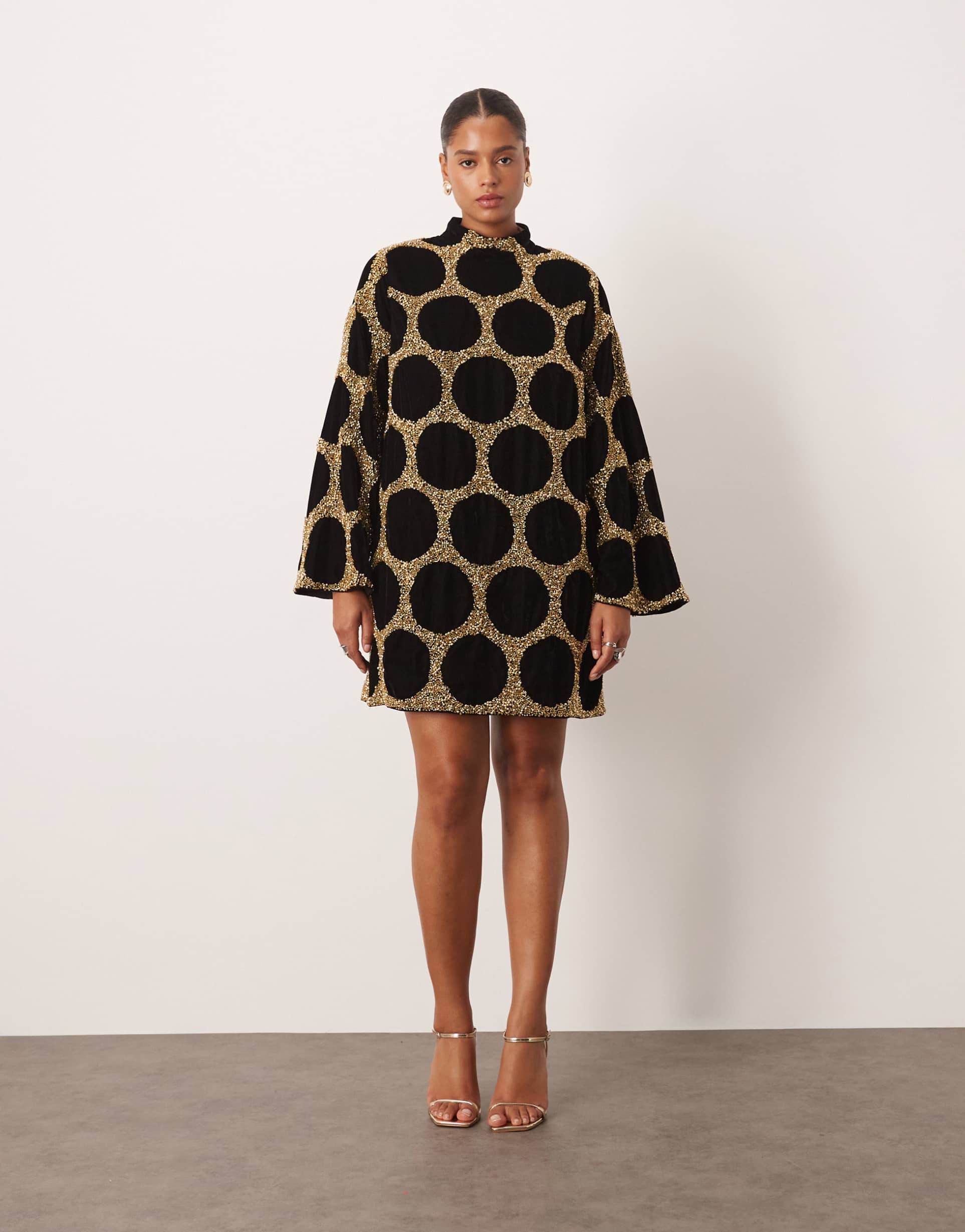 arrange curve embellished spot high neck long sleeve mini dress in gold
