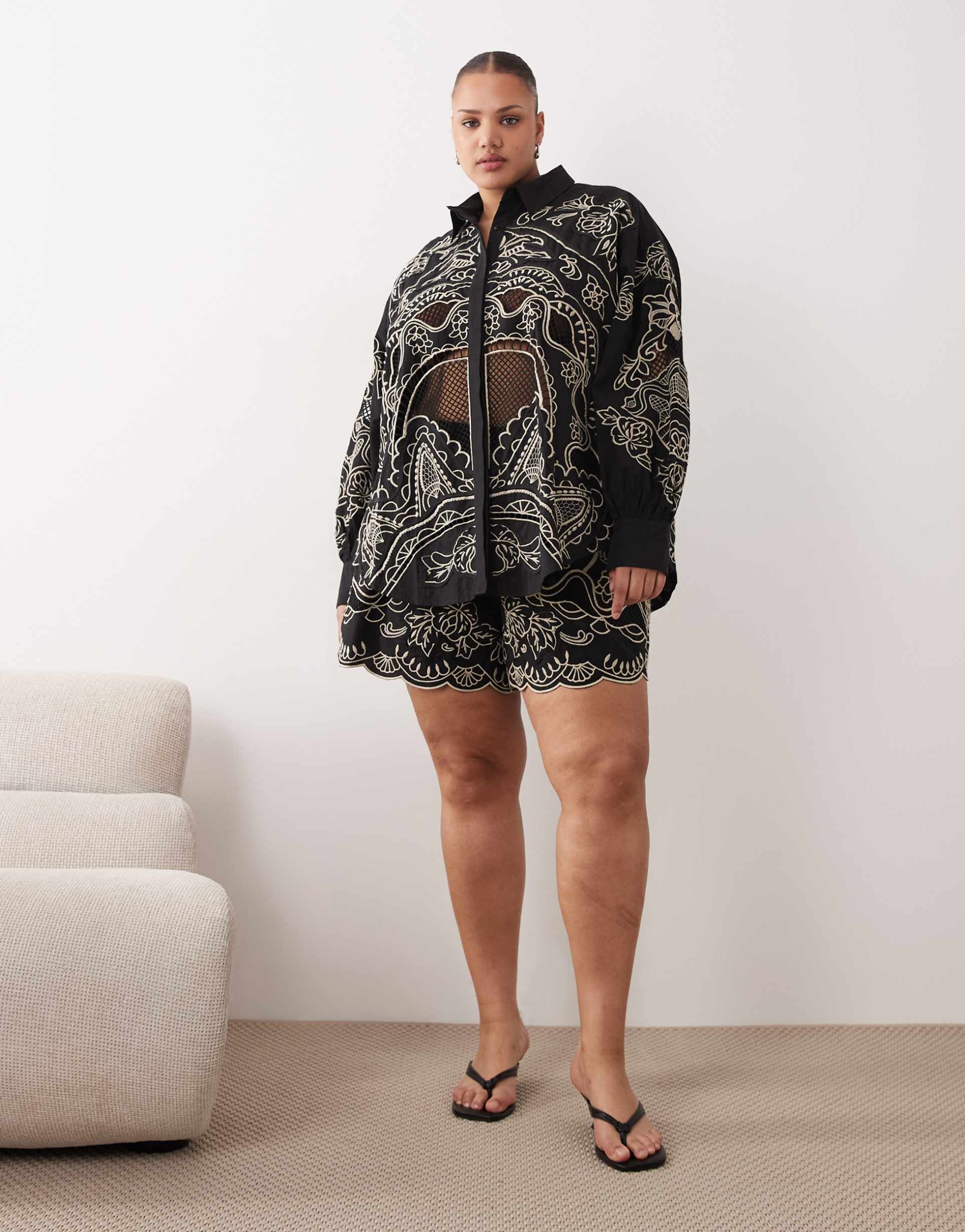 arrange curve embroidered cutwork cotton shorts in black - part of a set