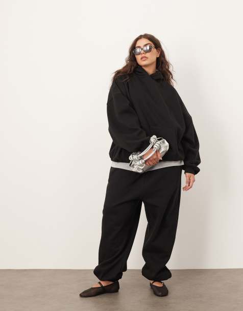 ARRANGE Curve - Jogging oversize en tissu épais haut de gamme avec pantalon à chevilles resserrées et sweat à capuche - Noir - view 1