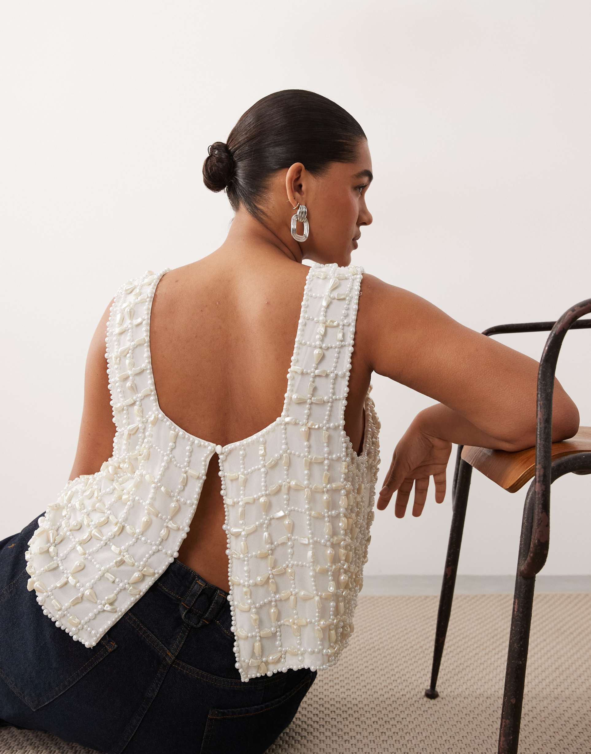 arrange curve pearl embellished top in ivory