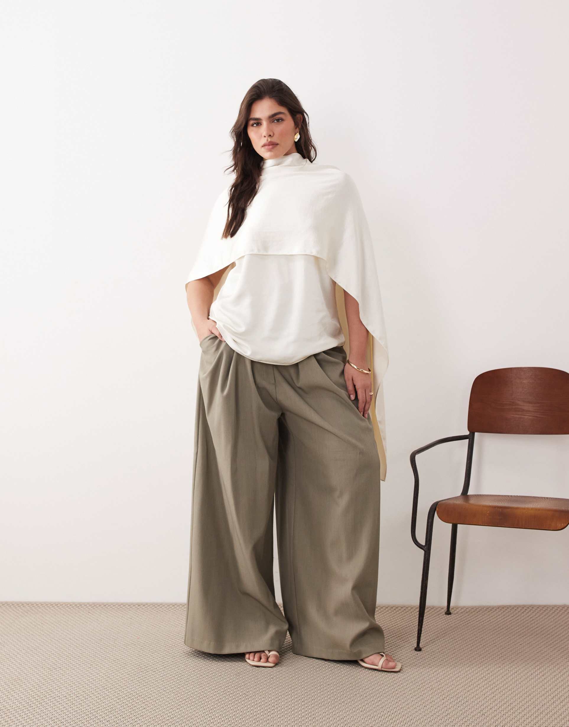 arrange curve satin underlay cape top in cream