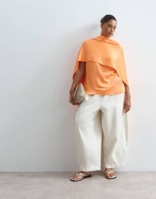 ARRANGE Curve satin underlay cape top in orange, 2 of 4