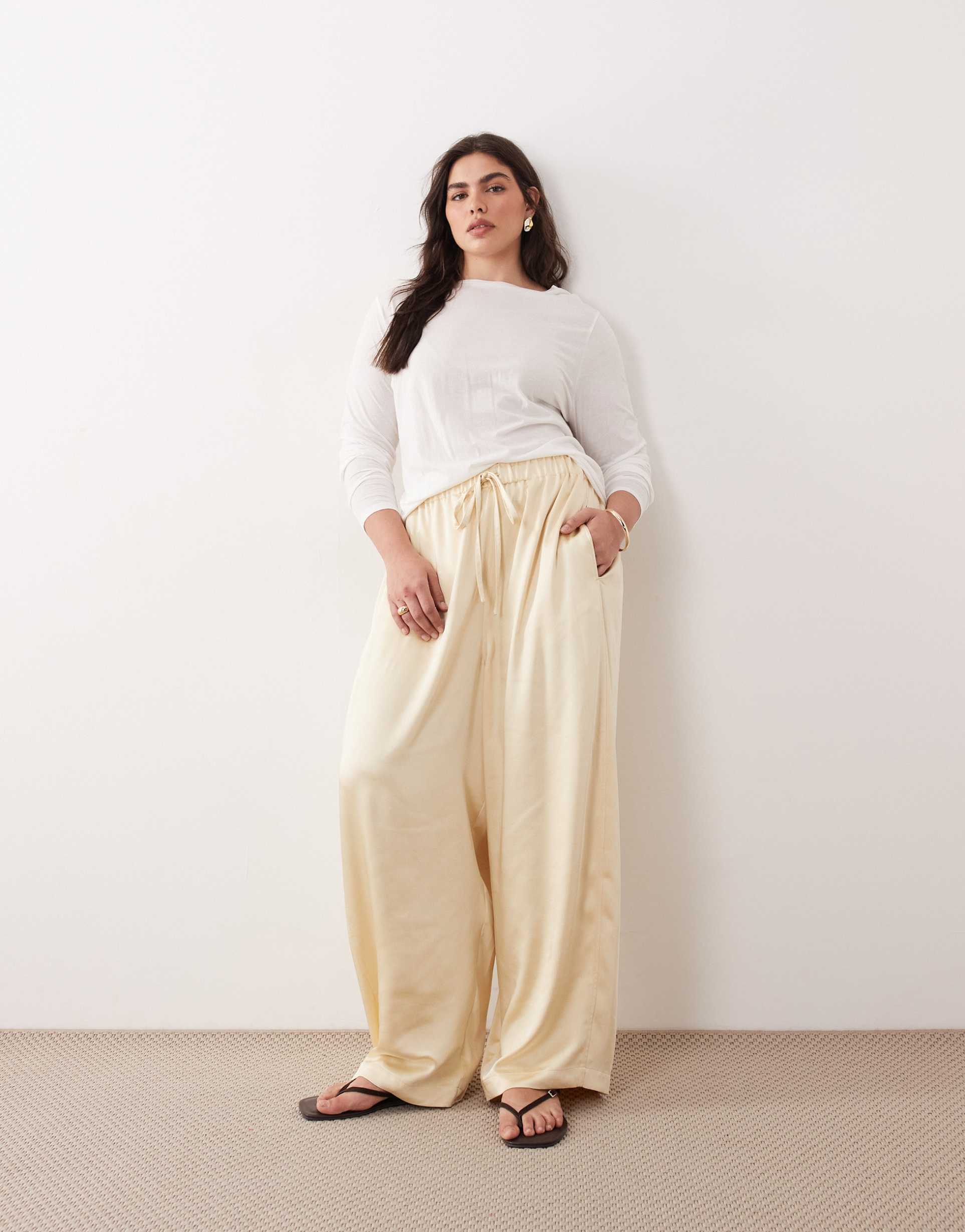 arrange curve satin wide leg pants in cream