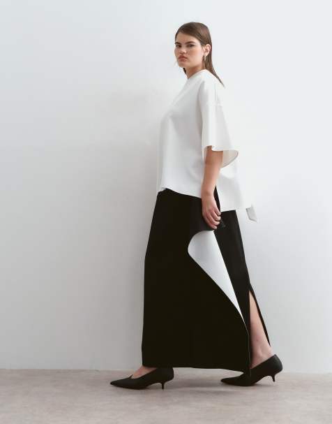 ARRANGE Curve tailored midi skirt with contrast drape detail in black
