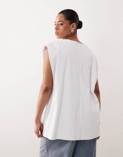 ARRANGE Curve – Vit, ärmlös t-shirt i oversize med axelvaddar och sidoslits, 4 av 4