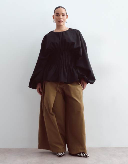 ARRANGE Curve volume sleeve pleated cinched waist top in black, 2 of 4