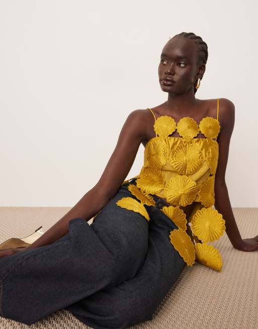 ARRANGE cut work floral fringe hem top in gold