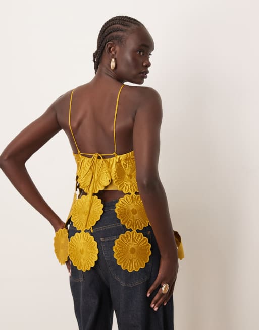 ARRANGE cut work floral fringe hem top in gold