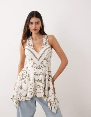 ARRANGE cutwork embroidered longline trapeze hem top