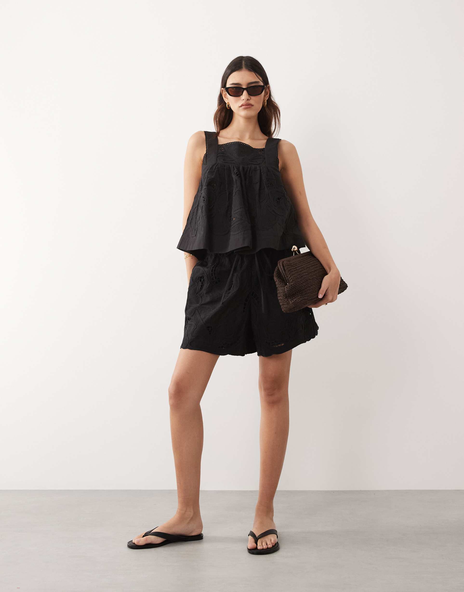 arrange cutwork floral embroidered shorts in black - part of a set