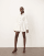 ARRANGE denim sculpted mini dress in off white