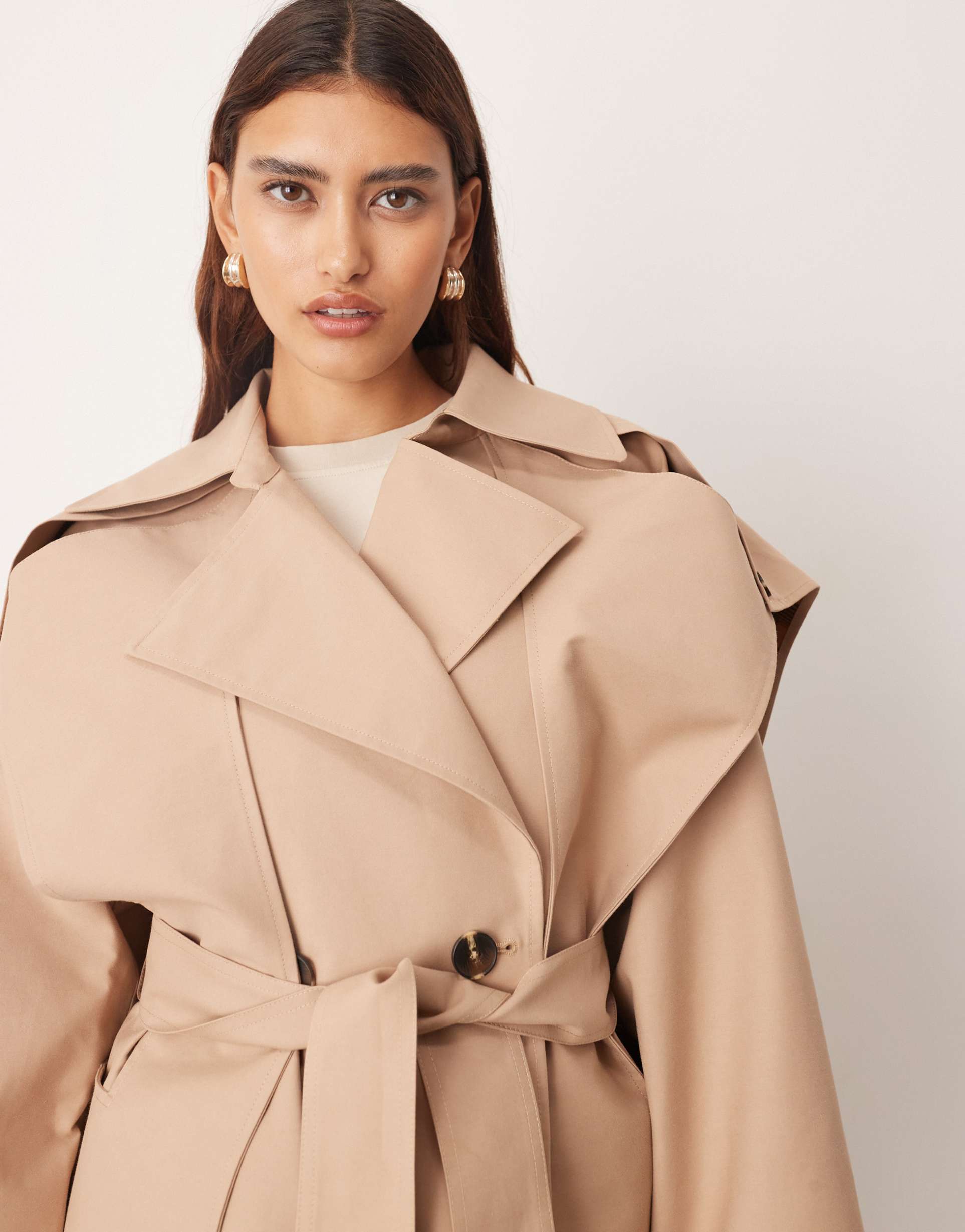arrange double breasted cropped trench coat with cape detail in tan