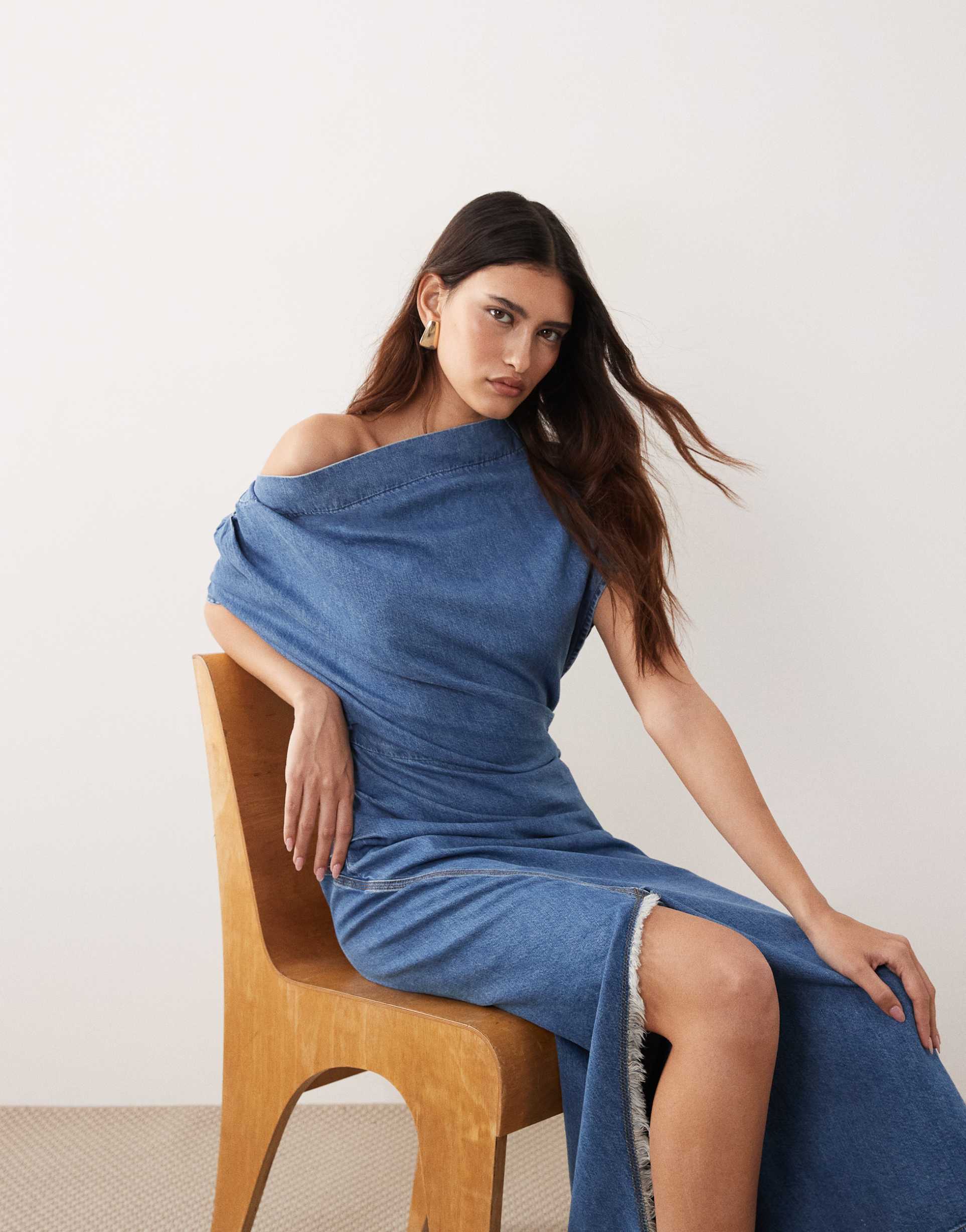 arrange draped denim maxi dress in mid wash blue