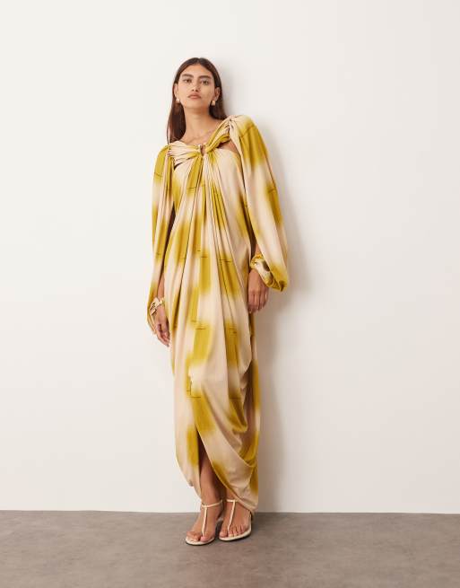 ARRANGE draped midi dress with balloon sleeve and hardware detail in blurred print