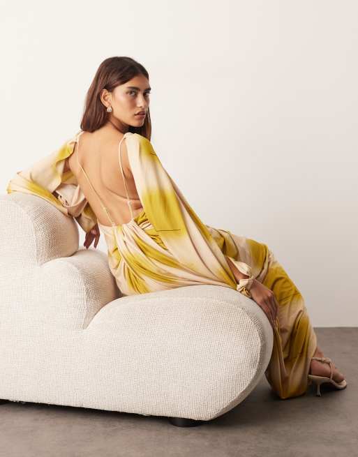 ARRANGE draped midi dress with balloon sleeve and hardware detail in blurred print