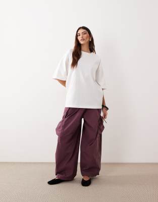 ARRANGE drawstring utility pants in washed purple