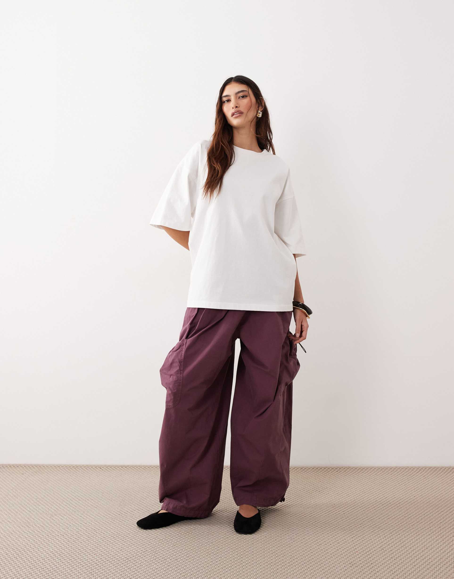 arrange drawstring utility pants in washed purple