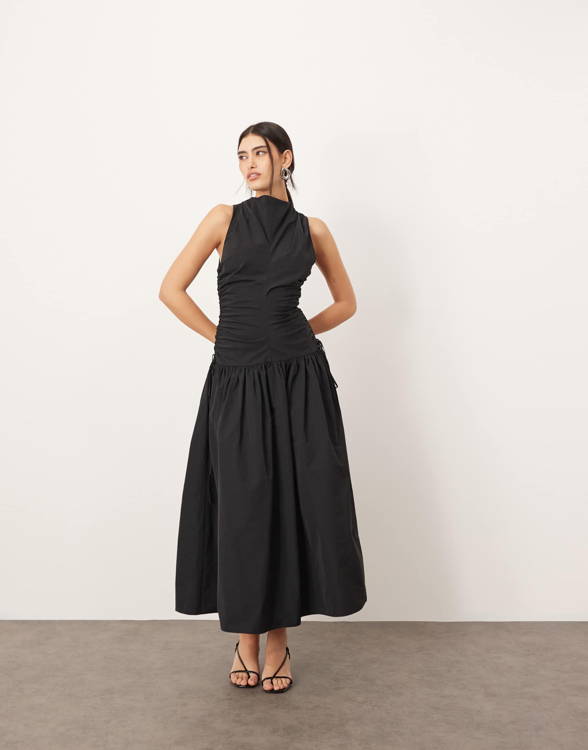 arrange drop waist ruched detail funnel neck maxi dress in black