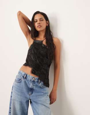 ARRANGE ARRANGE embellished asymmetric top with raw edge in black