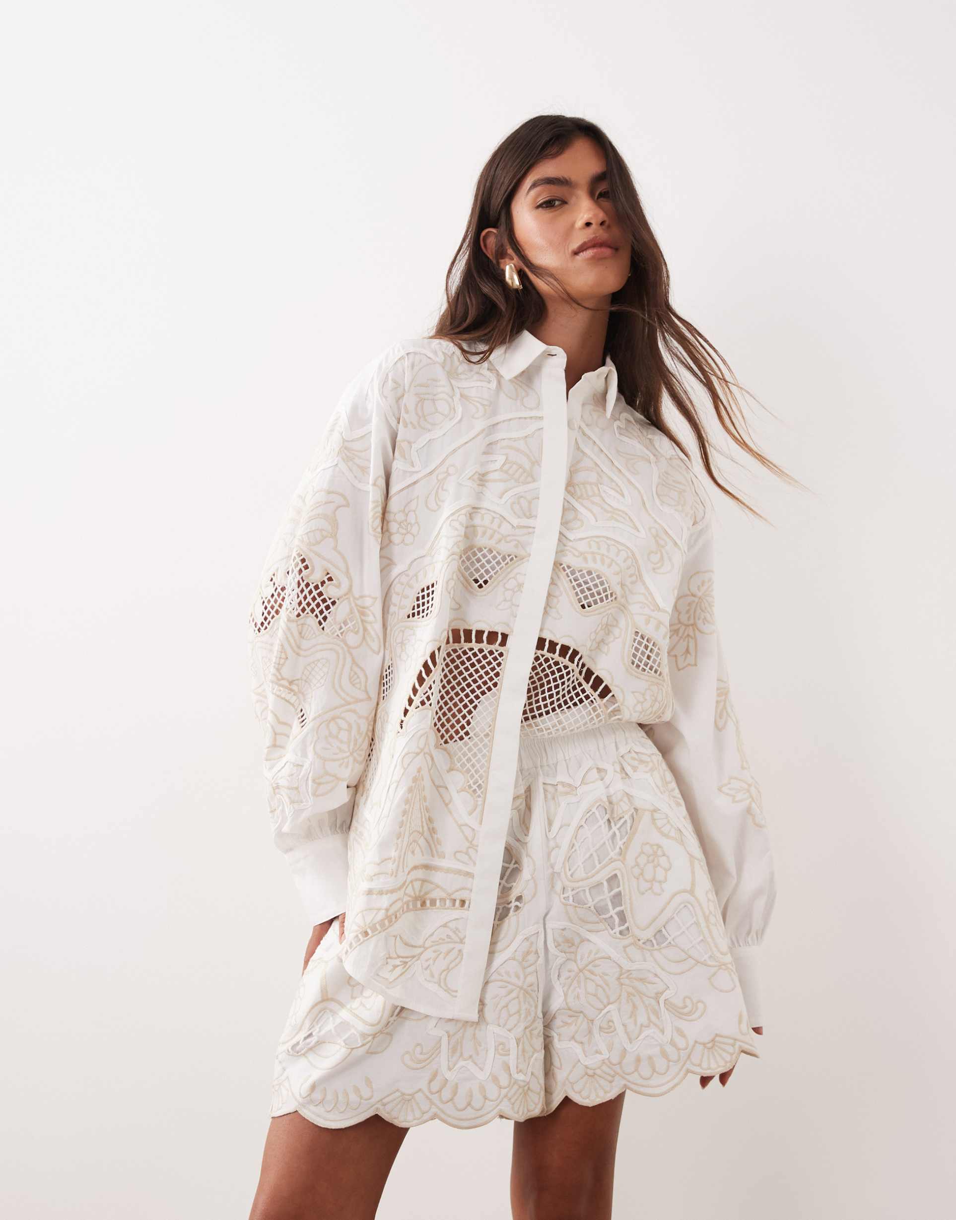 arrange embroidered cutwork shorts in white - part of a set