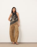 [ARRANGE] ARRANGE embroidered halterneck asymmetric fringe hem longline top in black 14 Black