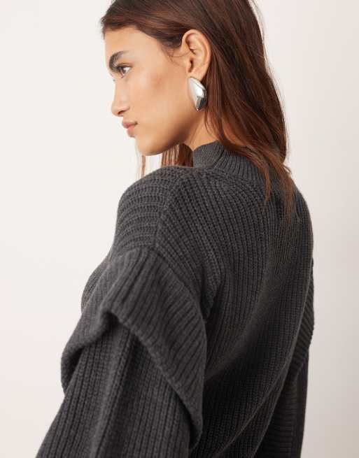 ARRANGE engineered knit sculpted sweater with shoulder detailing in charcoal