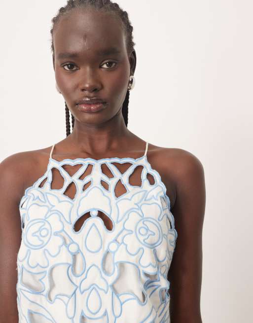 ARRANGE floral cut work halterneck mini dress with contrast stitch in blue