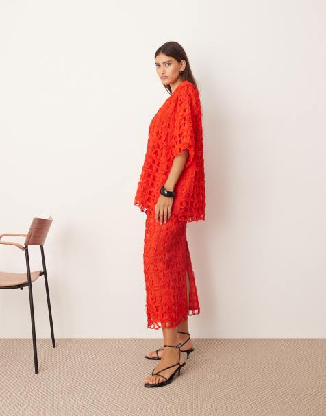 ARRANGE floral cutwork oversized T-shirt and column midi skirt in red - view 1