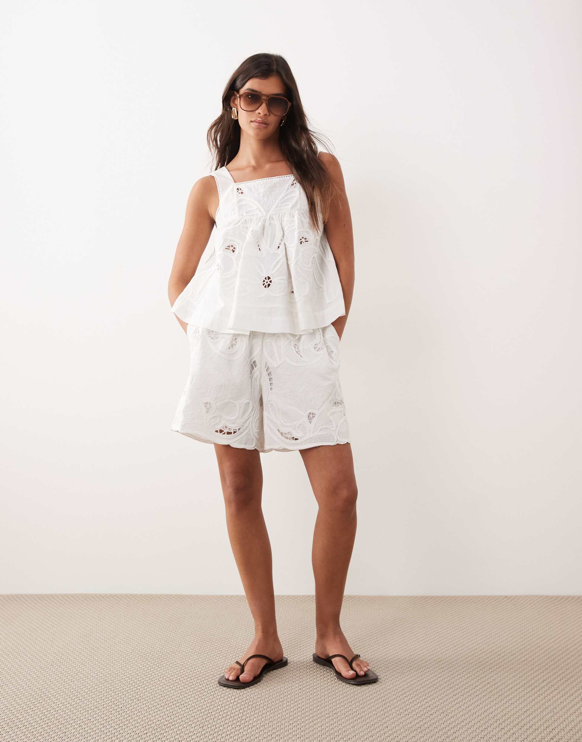 arrange floral embroidered shorts in white - part of a set