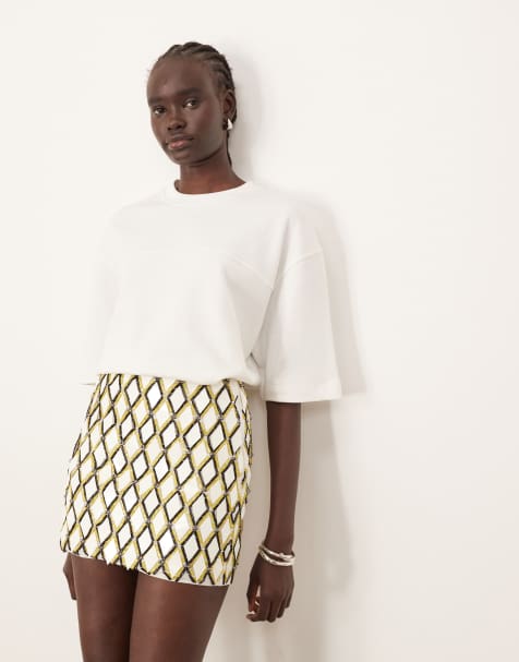 ARRANGE geometric grid embellished mini skirt in white - view 1