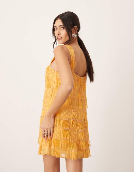 ARRANGE grid embellished square neck shift mini dress with fringe in orange