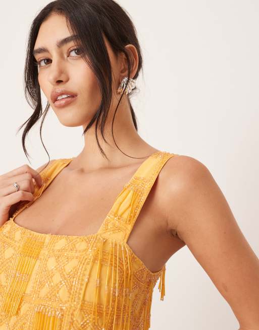 ARRANGE grid embellished square neck shift mini dress with fringe in orange