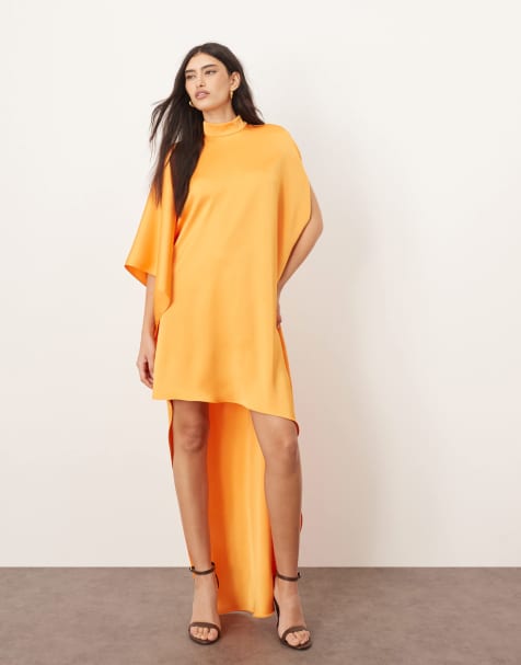 ARRANGE high neck cape sleeve mini dress with asymmetric hem in apricot - view 1