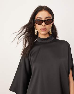 ARRANGE HIGH NECK CAPE SLEEVE MINI DRESS WITH ASYMMETRIC HEM 