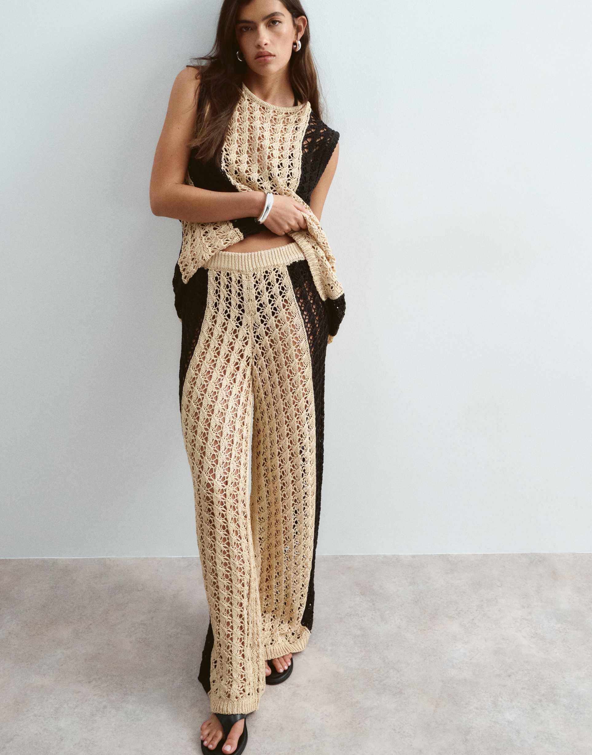 arrange knit pants in black and cream contrast - part of a set