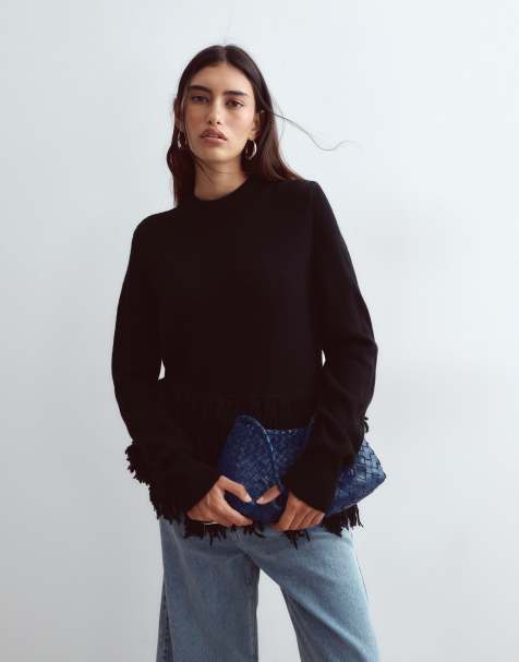ARRANGE knitted jumper with fringe hem in black - view 1