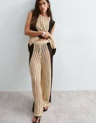 ARRANGE knitted trousers co-ord in black and cream contrast