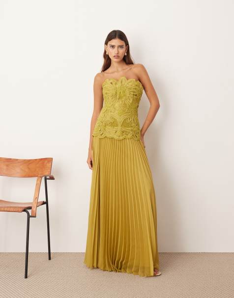 ARRANGE abstract cut work bandeau maxi dress with pleat skirt in olive green